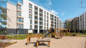 Sân chơi trẻ em tại Flatbook - Seaside Apartments Porto Gdańsk