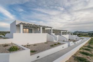 a rendering of a white house with white walls at Sunset Village 2 in Paleochori