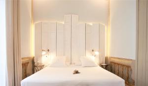 Postel nebo postele na pokoji v ubytování Hotel Madinat