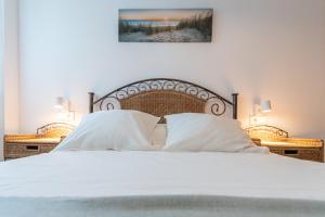 Posteľ alebo postele v izbe v ubytovaní Apartamento Planta Baja Coto Sancti Petri Playa de la Barrosa