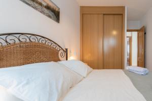 Posteľ alebo postele v izbe v ubytovaní Apartamento Planta Baja Coto Sancti Petri Playa de la Barrosa