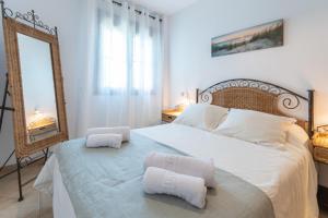 Posteľ alebo postele v izbe v ubytovaní Apartamento Planta Baja Coto Sancti Petri Playa de la Barrosa