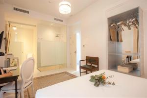 Postel nebo postele na pokoji v ubytování Hotel Madinat