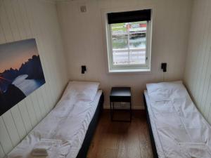 Llit o llits en una habitació de Stambua, Stamsund