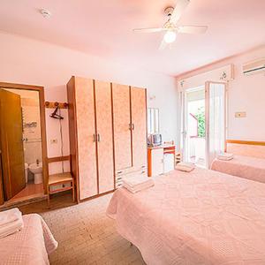 Postel nebo postele na pokoji v ubytování Hotel Rosa