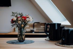Kemudahan buat kopi dan teh di Luxuriöse und stilvolle Ferienwohnung in bester Lage Bremens