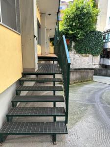 a group of steps leading up to a building at Easy Milano Apartment Navigli in Milan