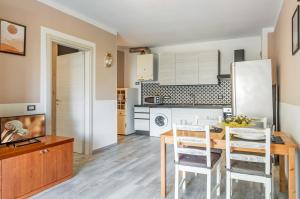 Kuchyň nebo kuchyňský kout v ubytování Domus Lucis Apartment Terrace & Private Parking + 6 fotografií