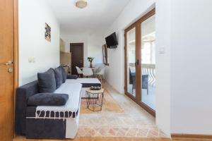 TV a/nebo společenská místnost v ubytování Guest House Zuber
