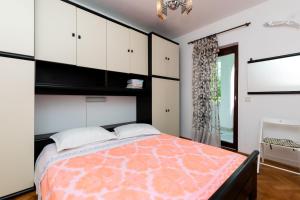 Postel nebo postele na pokoji v ubytování Apartments Anka