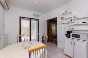 Kuchyň nebo kuchyňský kout v ubytování Apartments Anka