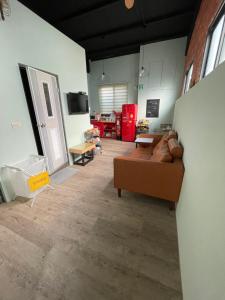 Area soggiorno di HeMei Homestay