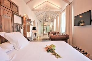 Postel nebo postele na pokoji v ubytování Hotel Madinat