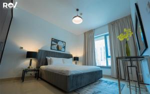 En eller flere senger på et rom på Luxury 2 Bedroom Suite with Full Burj Khalifa View