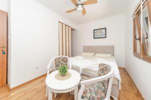 Postel nebo postele na pokoji v ubytování Guest House Zuber