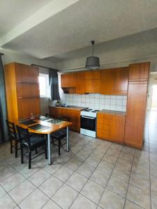 A kitchen or kitchenette at Cathrin Beach Apartments