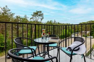 Balkón nebo terasa v ubytování Na Wydmach Apartment Międzywodzie by Noclegi Renters