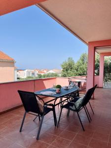 Balkón nebo terasa v ubytování Pink Panther