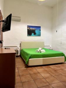 Postel nebo postele na pokoji v ubytování La Pergola B&B