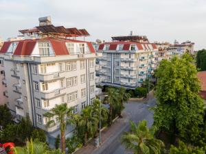 an aerial view of buildings in a city at Alanya Risus Park Hotel in Alanya