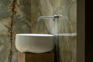 Vannituba majutusasutuses Baia Di Ulisse Wellness & Spa