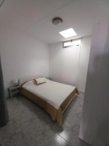 Łóżko lub łóżka w pokoju w obiekcie MyCasa