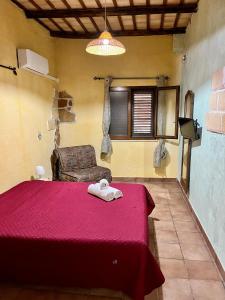Postel nebo postele na pokoji v ubytování La Pergola B&B