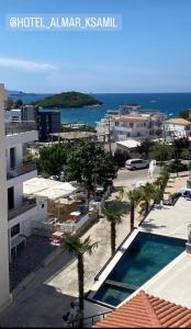 an aerial view of a resort with a swimming pool at Hotel AlMar in Ksamil