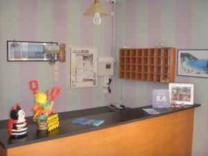 a toy kitchen with a counter with a sink at Katerina Lefkada in Vasiliki