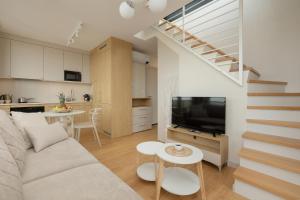 TV a/nebo společenská místnost v ubytování Lighthouse Luxury Penthouse - Jantar Apartamenty