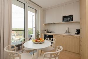Kuchyň nebo kuchyňský kout v ubytování Lighthouse Luxury Penthouse - Jantar Apartamenty