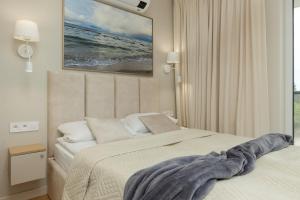 Postel nebo postele na pokoji v ubytování Lighthouse Luxury Penthouse - Jantar Apartamenty