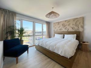 Ένα ή περισσότερα κρεβάτια σε δωμάτιο στο Luxury City Penthouse with views