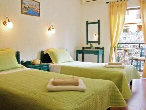 Postel nebo postele na pokoji v ubytování Victoria Hotel