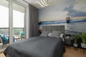 Postel nebo postele na pokoji v ubytování Lighthouse Luxury Penthouse - Jantar Apartamenty