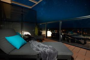Posezení v ubytování Lighthouse Luxury Penthouse - Jantar Apartamenty
