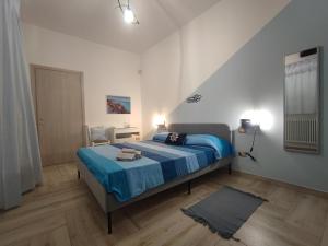 Postel nebo postele na pokoji v ubytování Sea Room Torre Lapillo