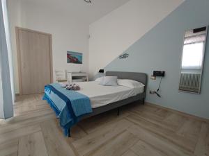 Postel nebo postele na pokoji v ubytování Sea Room Torre Lapillo