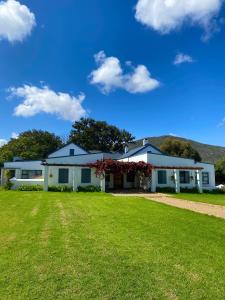 a house with a green lawn in front of it at Contreberg Manor House in Darling