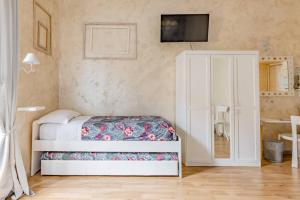 Posteľ alebo postele v izbe v ubytovaní Deluxe rooms and Chilling Jacuzzi Suite Guesthouse