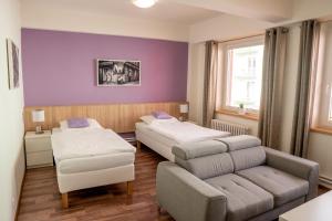 Postel nebo postele na pokoji v ubytování Penzion Staré Louny