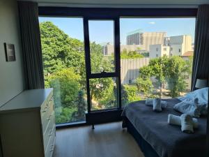 Posteľ alebo postele v izbe v ubytovaní RS SUITES PRESTIGE Racławickie 10 HOME & SPA
