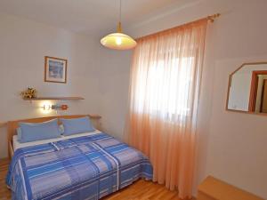 Posteľ alebo postele v izbe v ubytovaní Apartment Lola + 37 fotografií