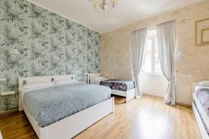 Posteľ alebo postele v izbe v ubytovaní Deluxe rooms and Chilling Jacuzzi Suite Guesthouse