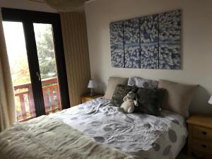 Ένα ή περισσότερα κρεβάτια σε δωμάτιο στο Chalet Individuel Orcières Merlette 1850m Pied des Pistes Vue Magnifique sur les Montagnes