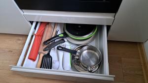 Kuchyňa alebo kuchynka v ubytovaní Apartmán Pálenica II