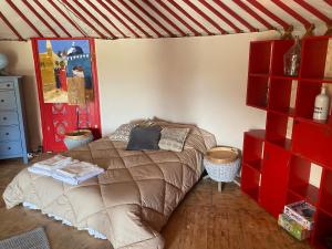 Postel nebo postele na pokoji v ubytování Yourte mongole