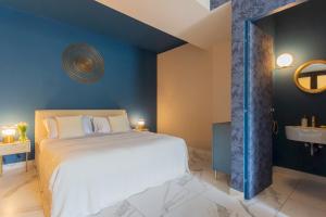 מיטה או מיטות בחדר ב-Vista Lario by Rent All Como