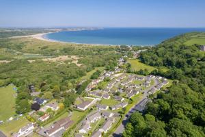 an aerial view of a park next to the beach at Ty Megan in Oxwich