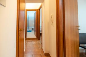 Postel nebo postele na pokoji v ubytování Casa Del Corso